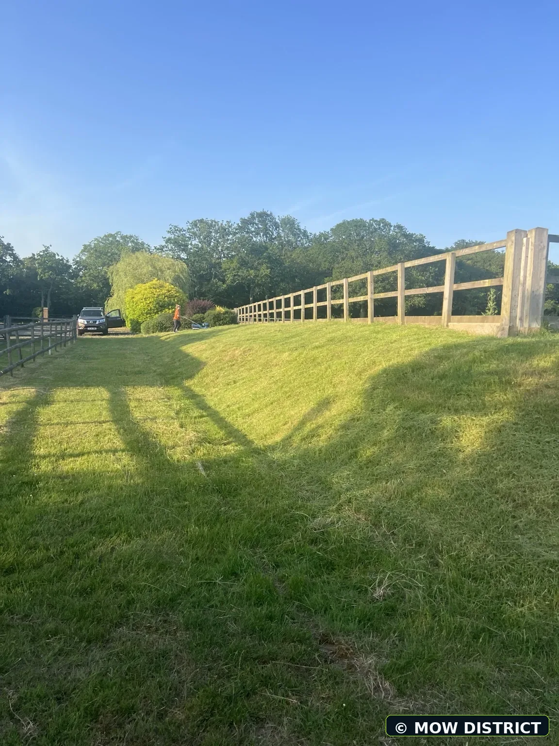 Freshly cut bank and gate approach after work completed