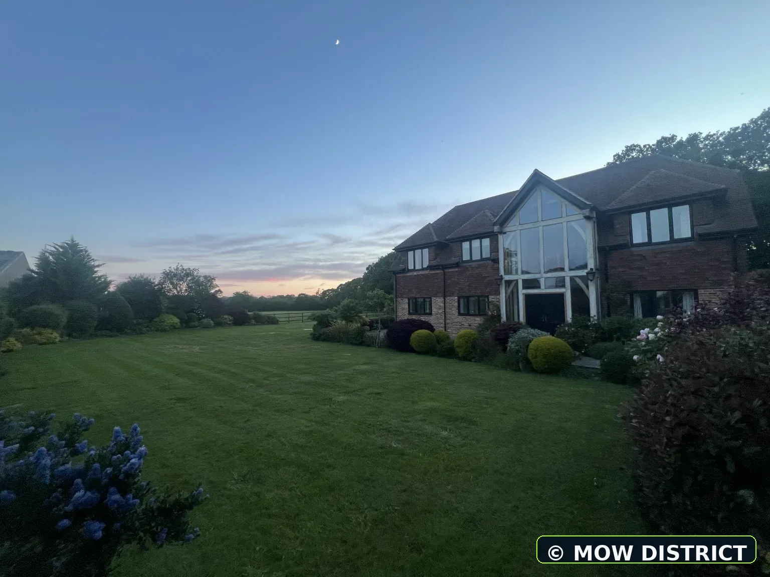 Large maintained front lawn at a country home